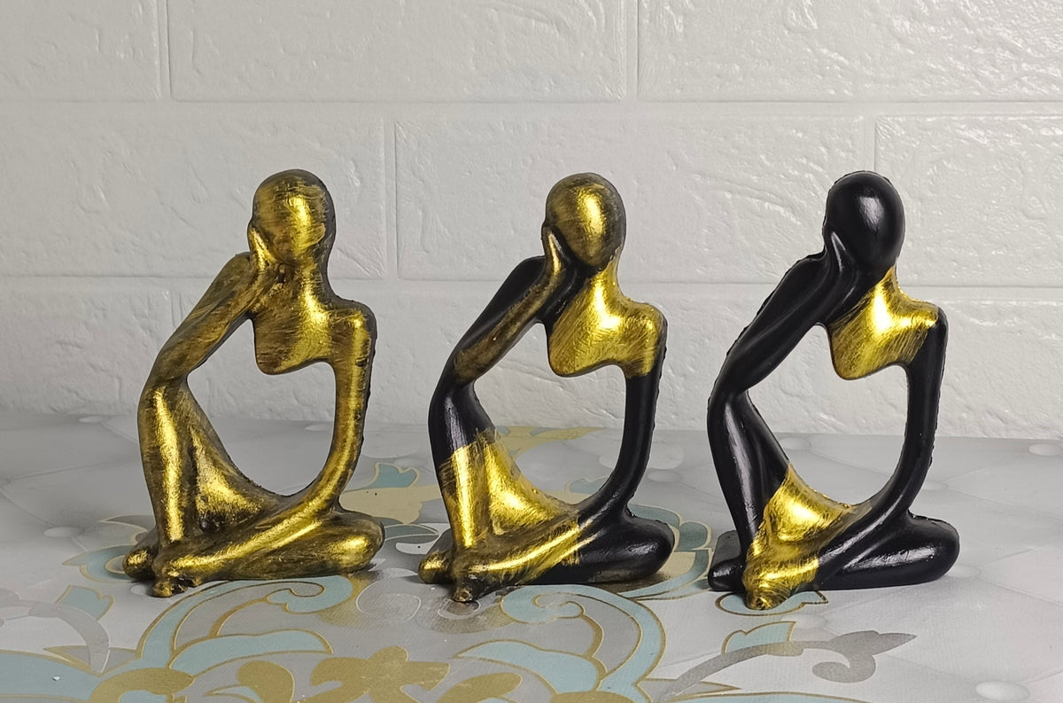 The Noir & Gold Minimalist 3-Piece Thinker Statue Set