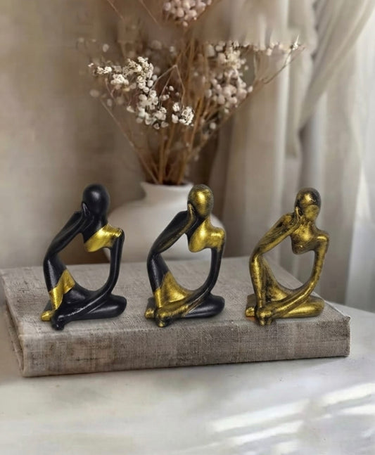 The Noir & Gold Minimalist 3-Piece Thinker Statue Set